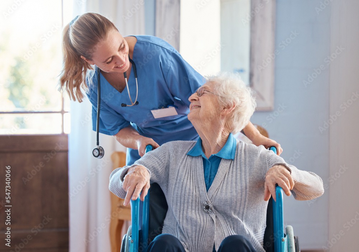 A compassionate nurse from Heal at Home Health LLC providing post-surgical care to a patient in their home.